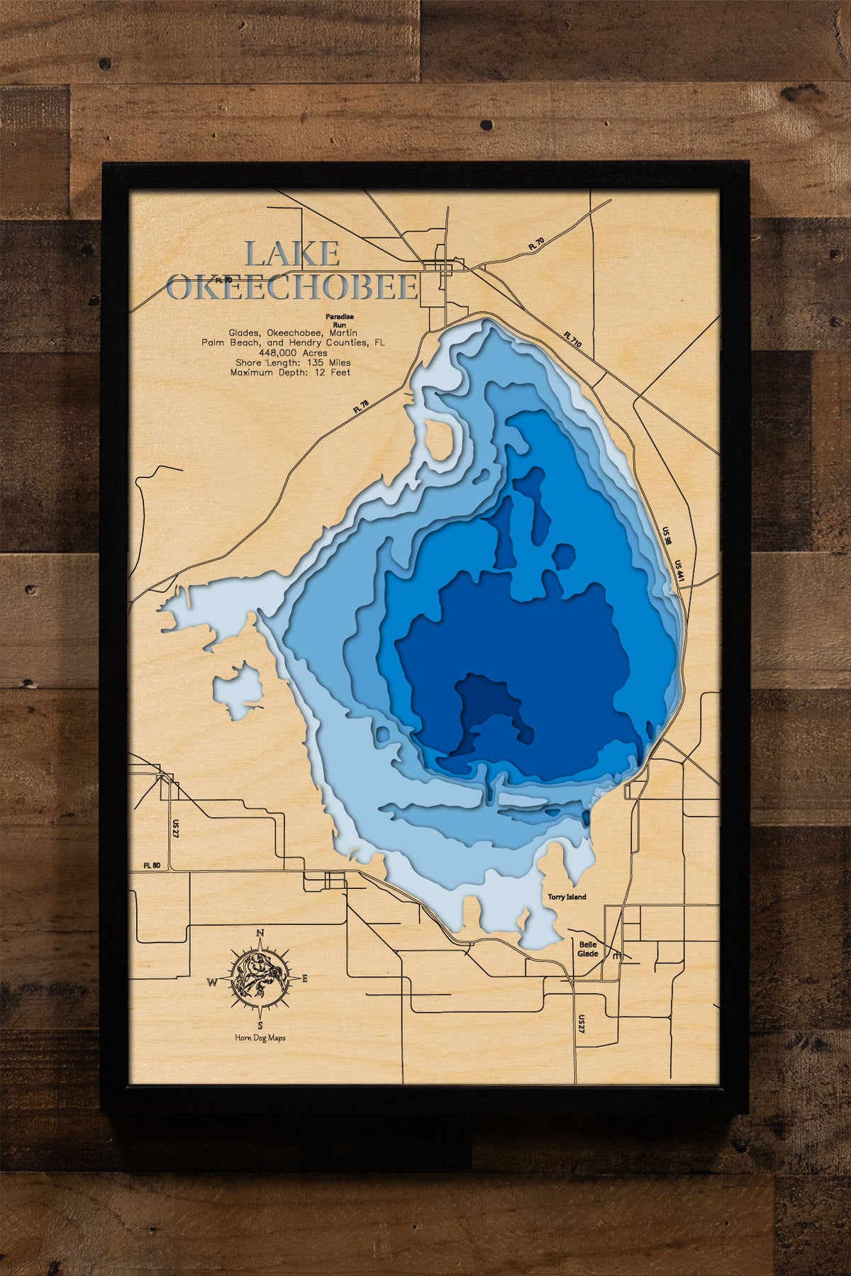 Lake Okeechobee, the largest freshwater lake in Florida and the second-largest natural freshwater lake entirely within the contiguous 48 states, spans across Glades, Hendry, Martin, Okeechobee, and Palm Beach Counties. Covering