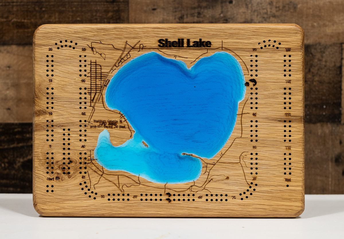 Artisanally carved wooden cribbage board of Shell Lake in Washburn County, WI, highlighting bathymetry.
