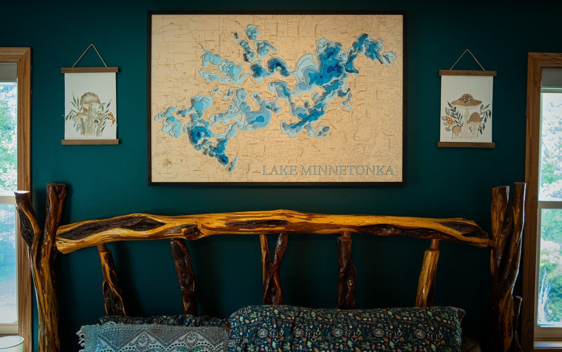 Horn Dog Maps 3D wooden lake map of Lake Minnetonka Minnesota displayed as wall decor above a rustic wood bed in a lake home bedroom