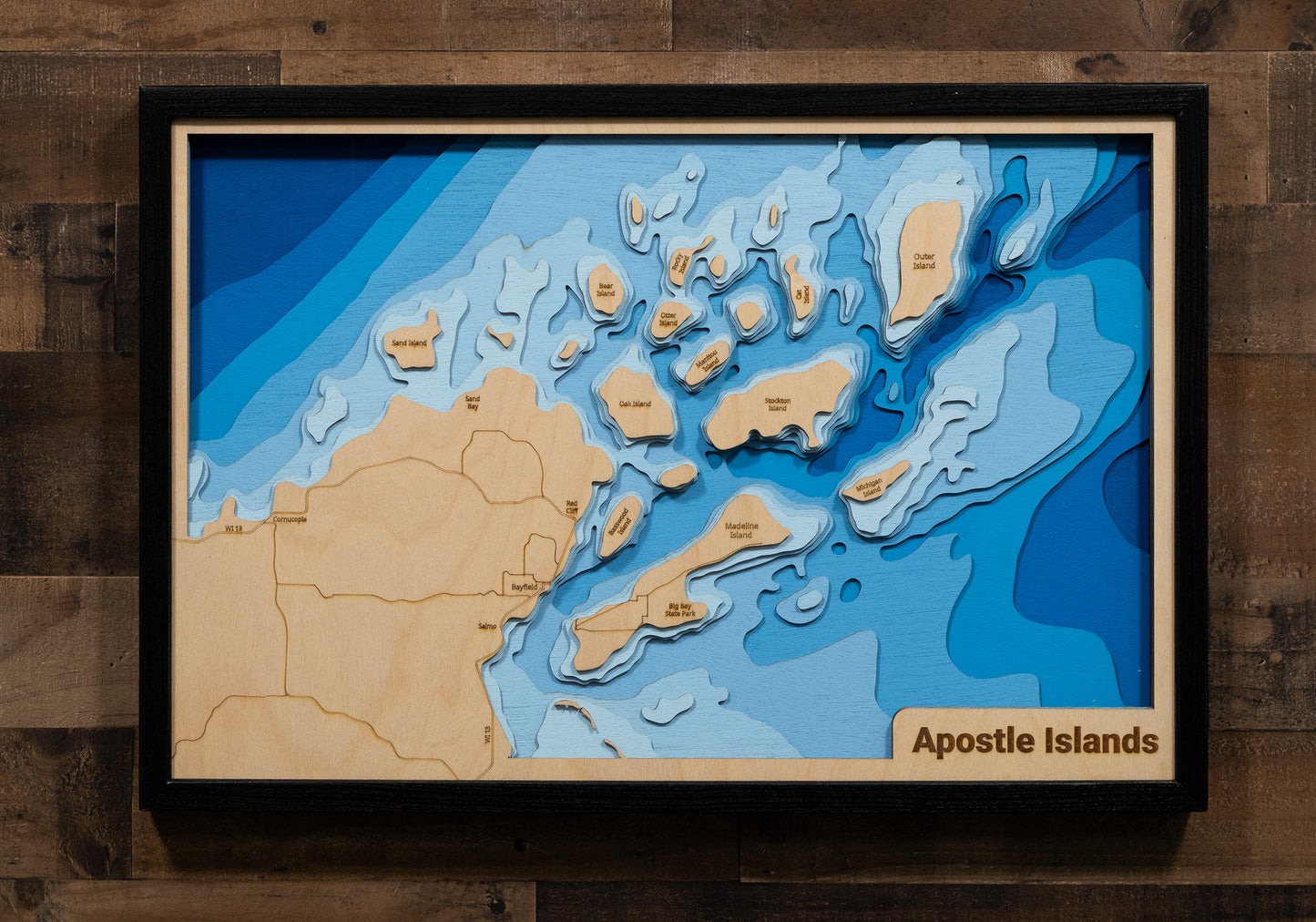 3D wooden lake map of Apostle Islands and Chequamegon Bay on Lake Superior, showcasing detailed depth layers and contours.