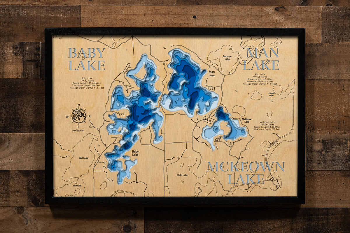 Baby, Man, and McKeown Lakes in Cass County, MN in stunning 3D wood map design, with detailed topography.