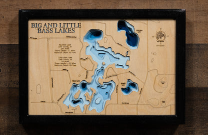 Artisanally carved wooden lake map of Big and Little Bass Lakes in Lake County, MI, highlighting bathymetry.