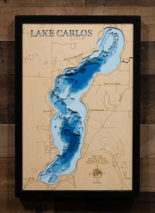 Detailed wooden relief map of Lake Carlos in Douglas County, MN, showcasing its natural beauty.