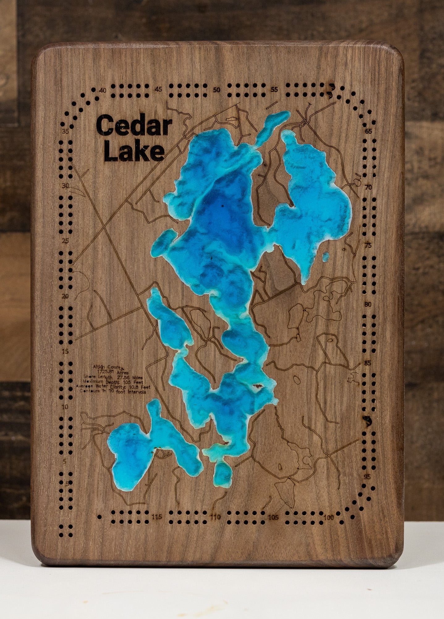 Decorative 3D wooden cribbage board of Cedar Lake in Aitkin County, MN, crafted with care.