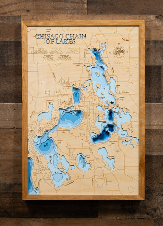 Detailed wooden relief map of Chisago Chain of Lakes in Chisago County, MN, showcasing its natural beauty.