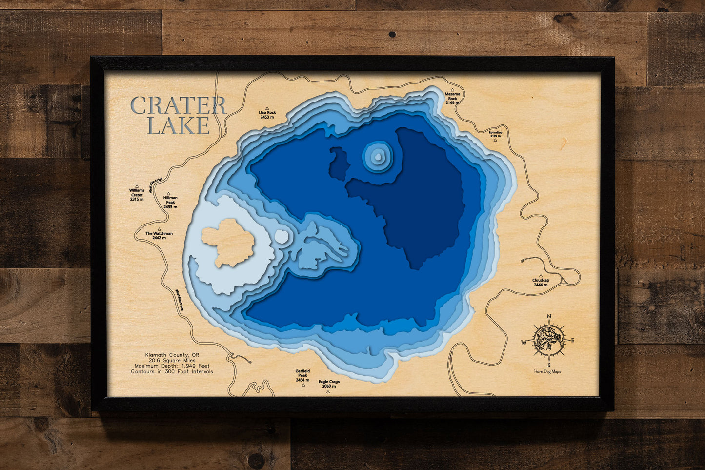 Artisanally carved wooden lake map of Crater Lake in Klamath County, OR, highlighting bathymetry.