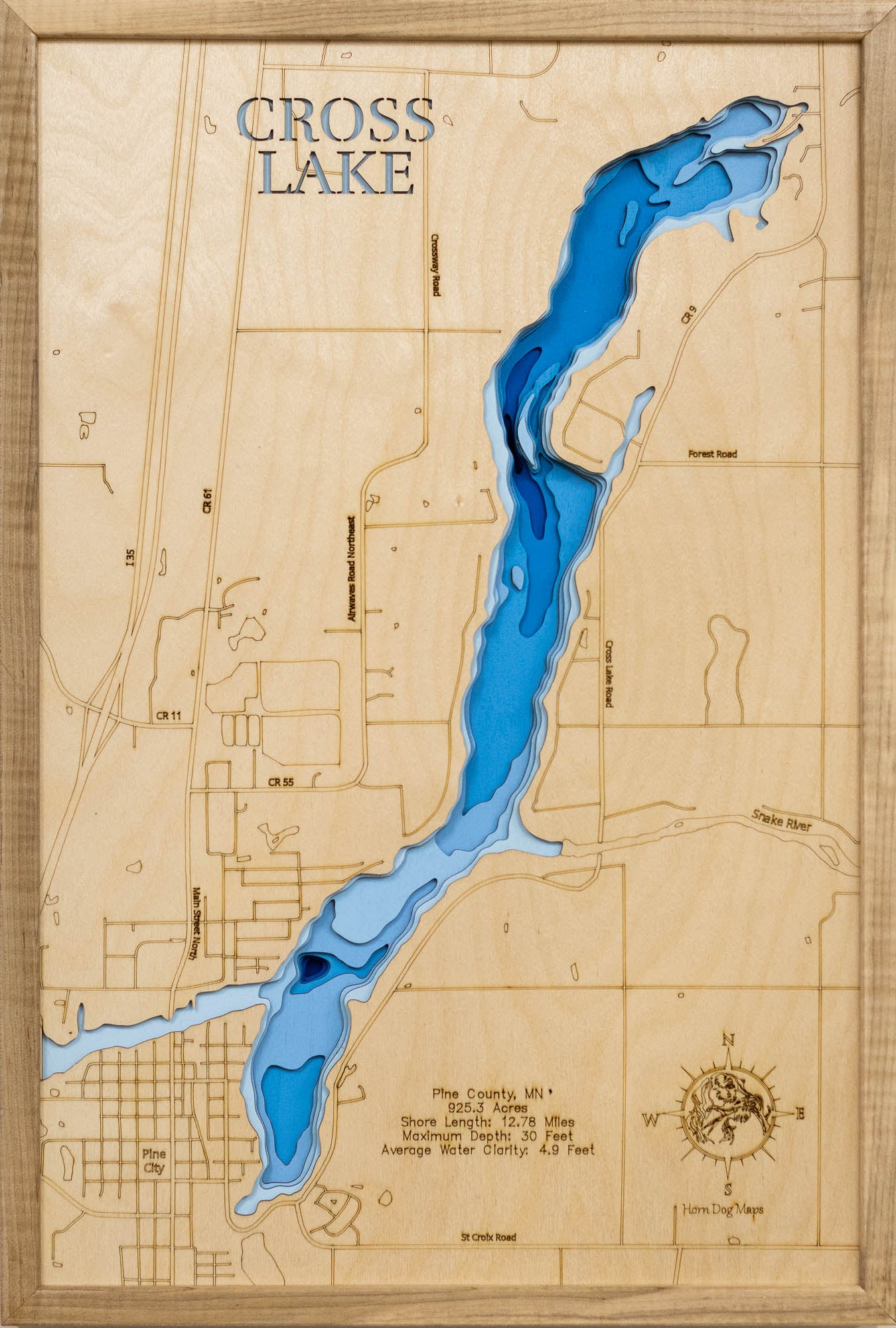 Detailed wooden relief map of Cross Lake in Pine County, Minnesota, showcasing its natural beauty.