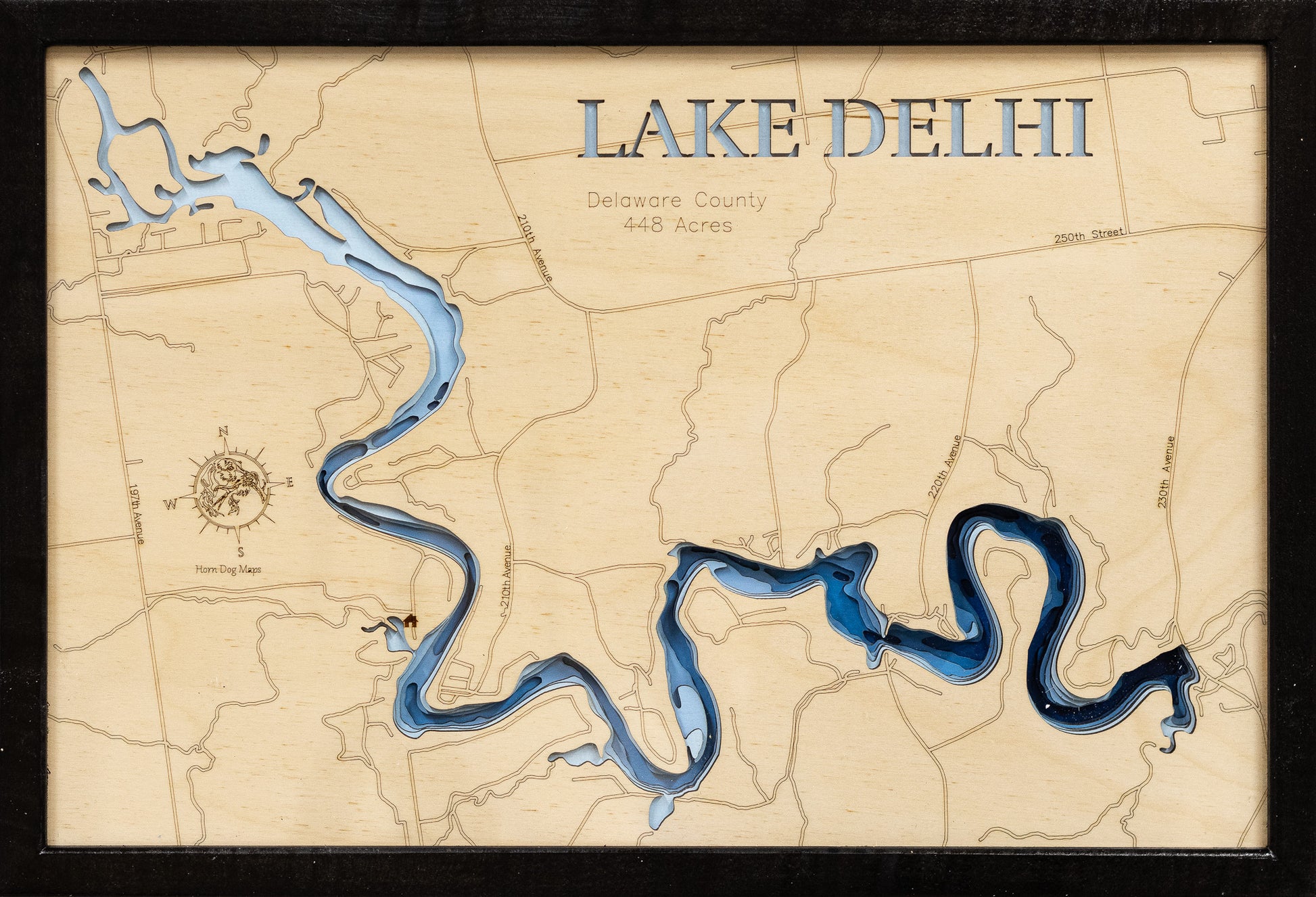 Detailed wooden relief map of Lake Delhi in Delaware County, IA, showcasing its natural beauty.