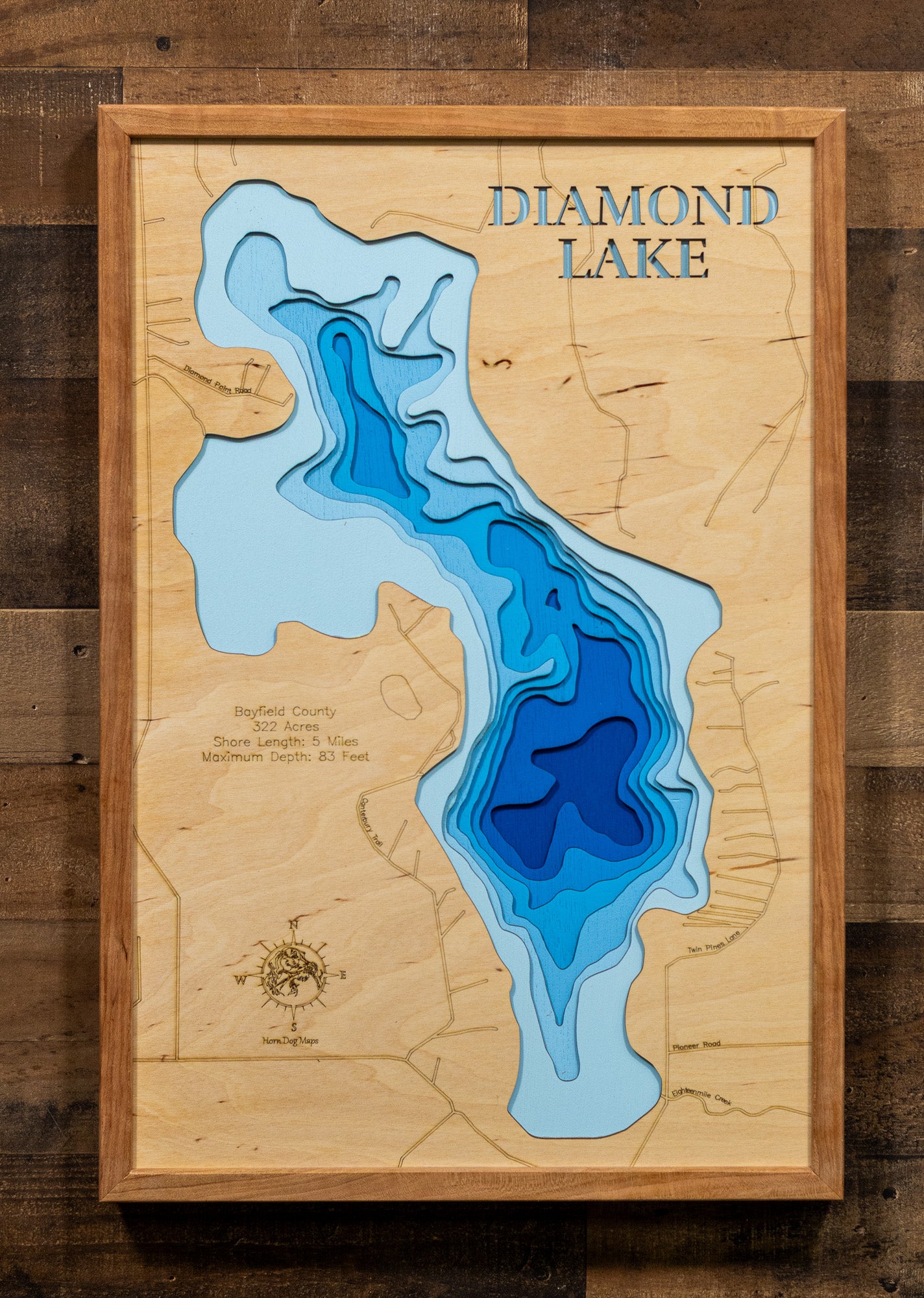 Custom wooden map of Diamond Lake in Bayfield County, WI with layered depth highlights.