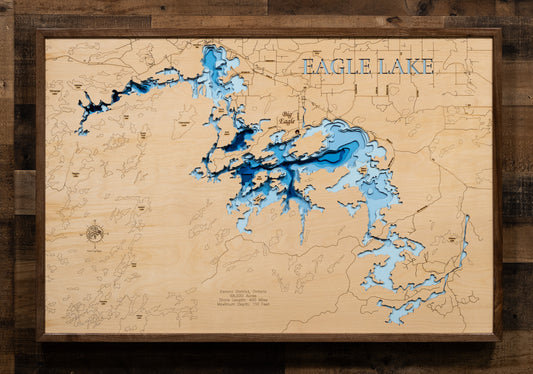 Laser-engraved relief map of Eagle Lake in Ontario Canada, crafted from wood with high precision.