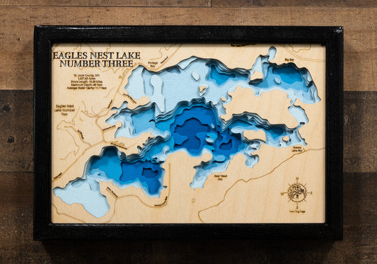 Laser-engraved relief map of Eagles Nest Lake Number Three in St. Louis County, MN, crafted from wood with high precision.