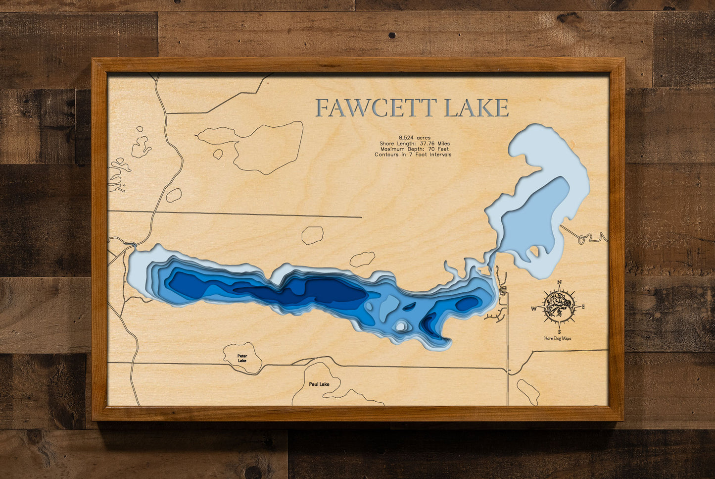 Artisanally carved wooden lake map of Fawcett Lake in Alberta Canada, highlighting bathymetry.