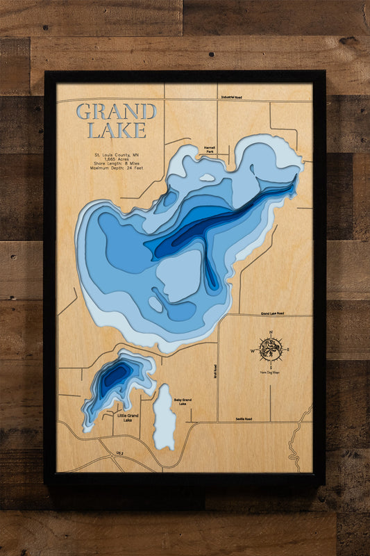A precision laser-cut, multi-layered wooden map of Grand Lake in St. Louis County, Minnesota, just northwest of Duluth near Hermantown. The natural wood top layer captures 8 miles of shoreline in fine detail, while a light-to-dark blue gradient highlights the lake's 24-foot depth. A handcrafted statement piece for any Duluth-area lake home, cabin, or outdoor enthusiast's wall.