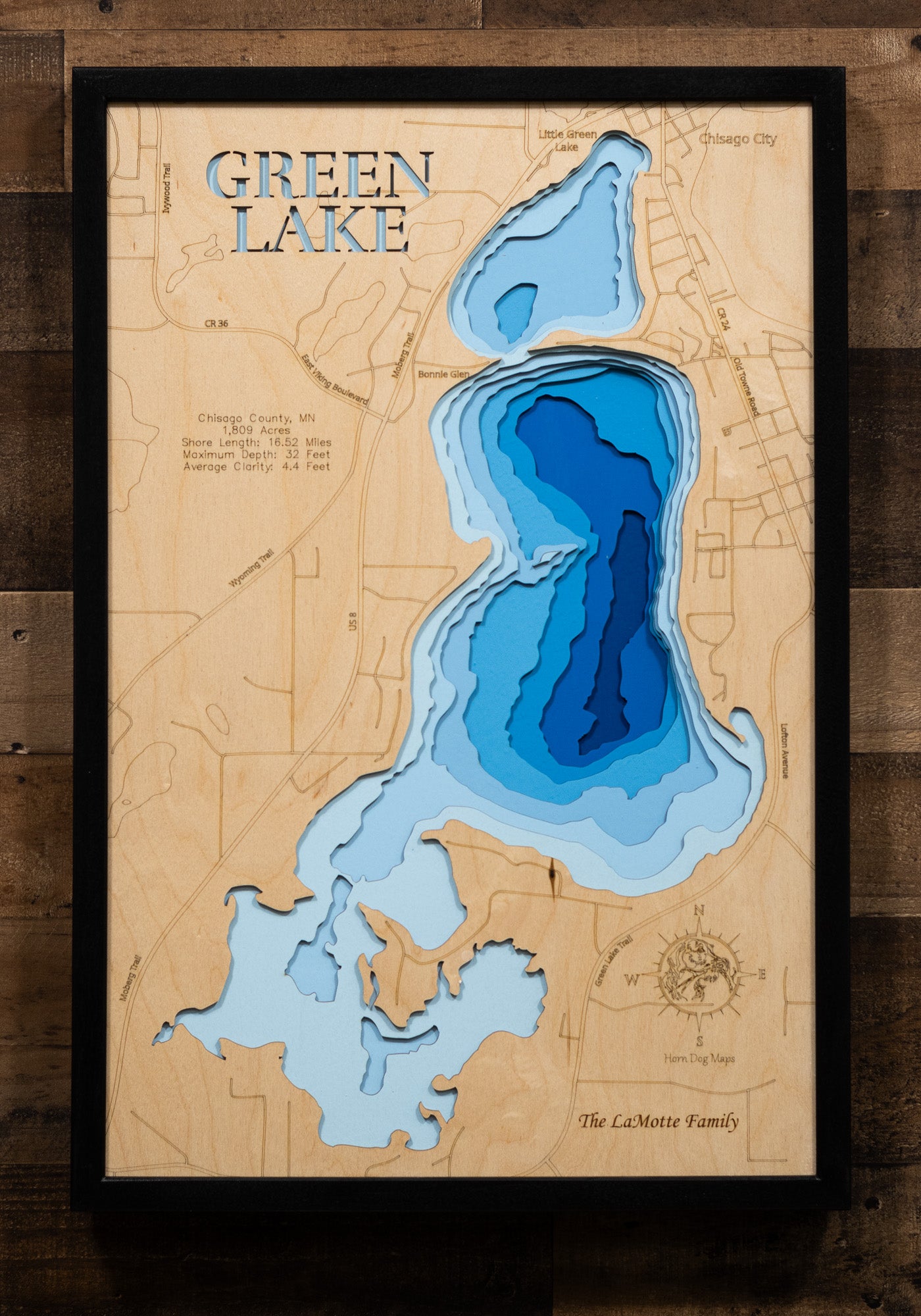 Detailed wooden relief map of Green Lake in Chisago County, Minnesota, showcasing its natural beauty.