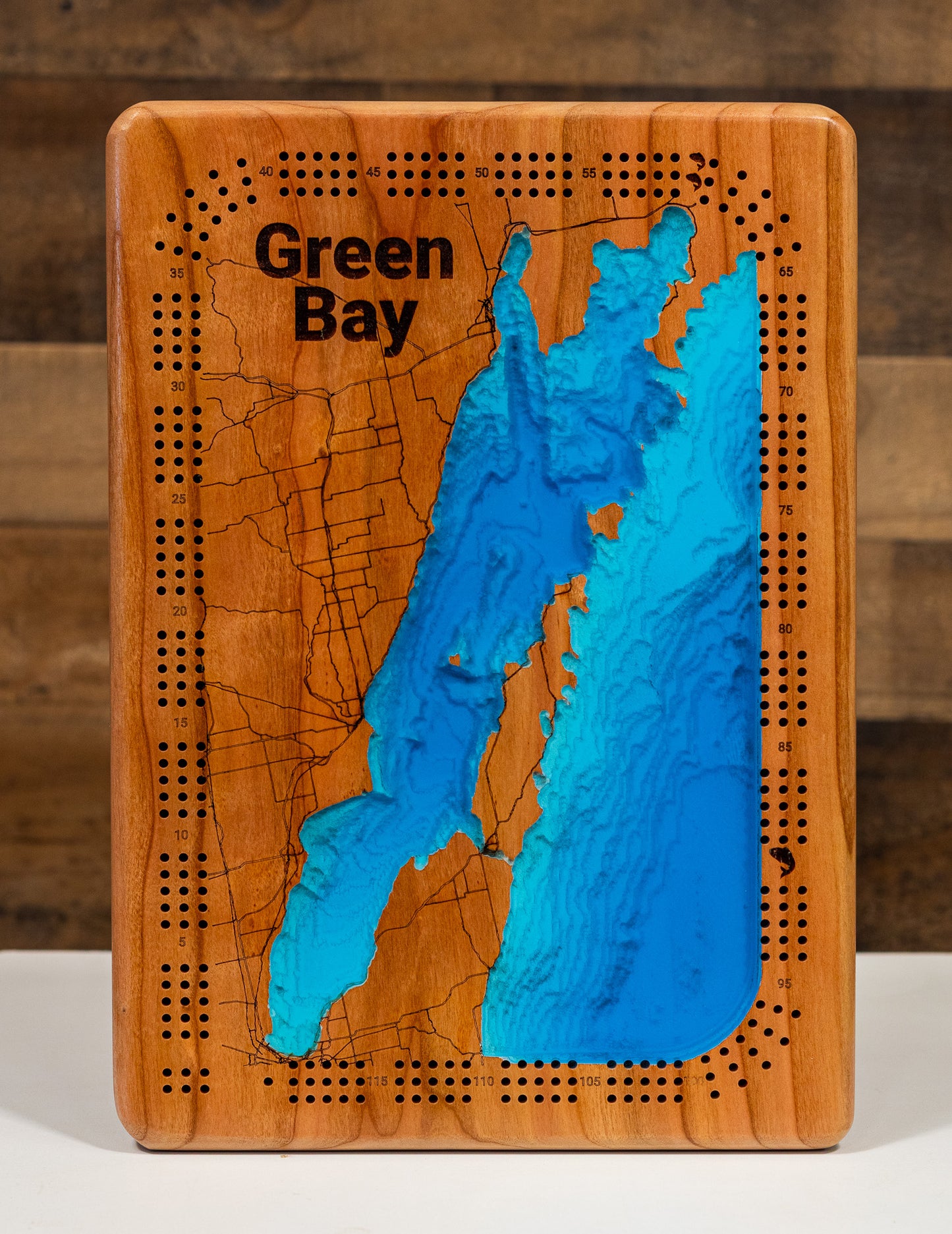 3D Wooden Cribbage Board of Green Bay in Wisconsin, crafted from wood with high precision.