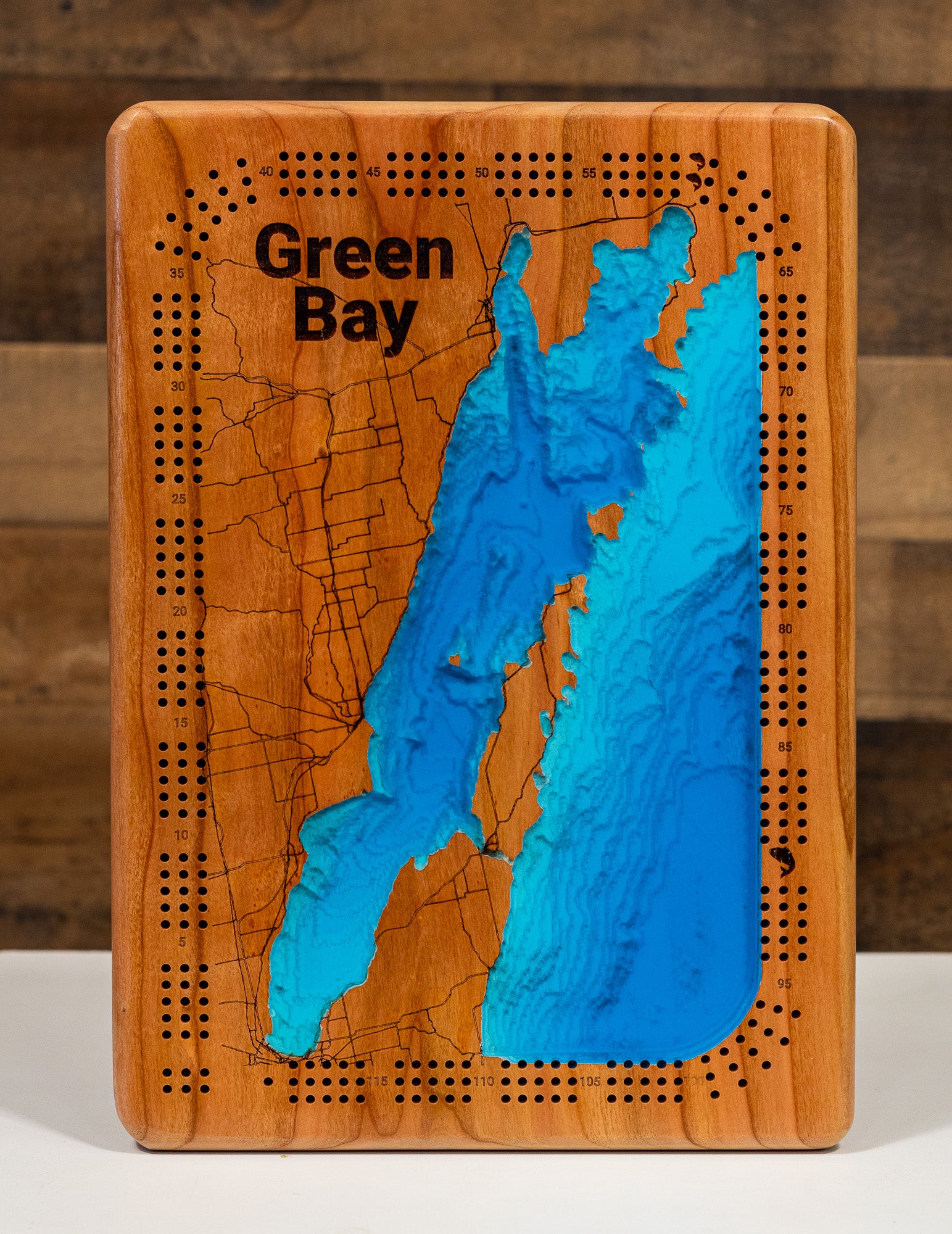 3D Wooden Cribbage Board of Green Bay in Wisconsin, crafted from wood with high precision.