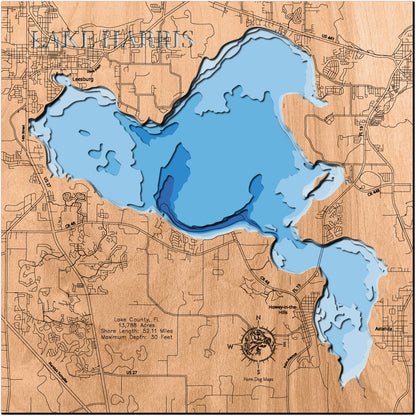 Laser-engraved relief map of Lake Harris in Lake County, FL, crafted from wood with high precision.