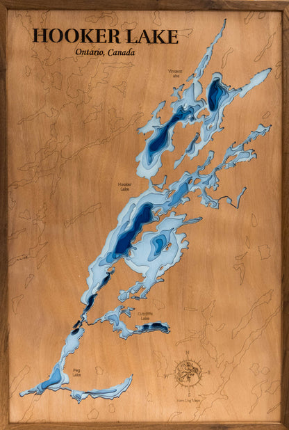 Unique wooden lake map of Hooker Lake in Ontario, Canada, featuring intricate depth details.