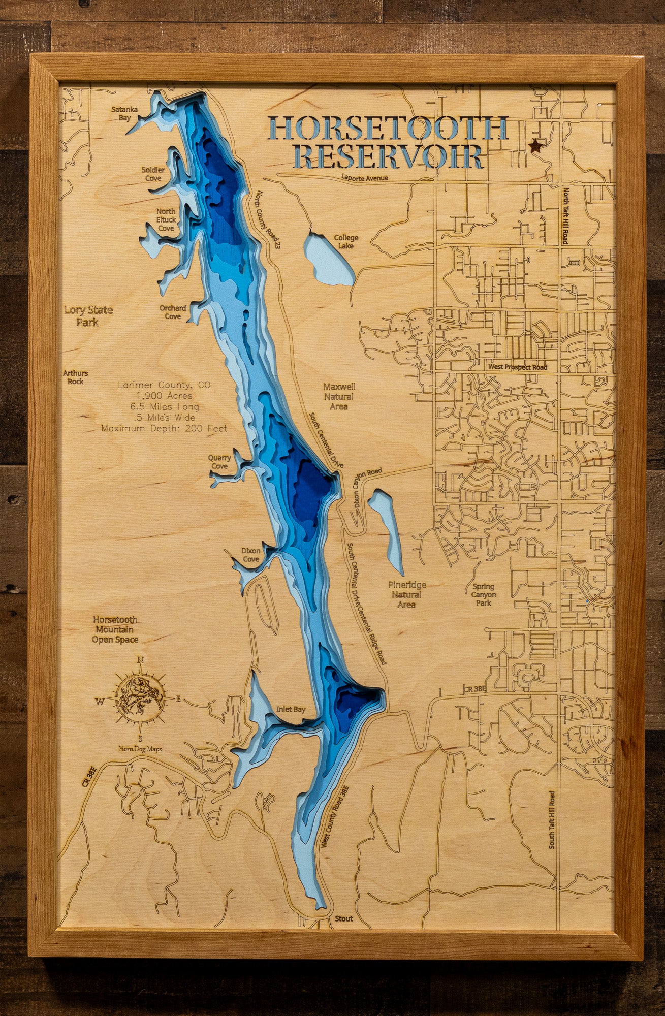 Artisanally carved wooden lake map of Horsetooth Reservoir in Larimer County, CO, highlighting bathymetry.