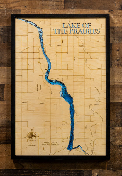 Detailed wooden relief map of Lake of the Prairies in Manitoba and Saskatchewan, showcasing its natural beauty.
