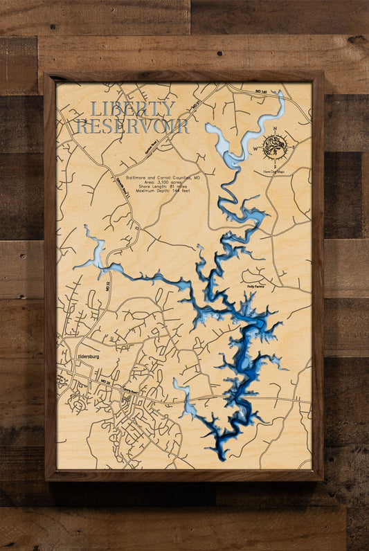 A laser-cut, layered wood map of Liberty Reservoir, Maryland, highlighting its extensive shoreline and surrounding forested areas in Baltimore and Carroll Counties.