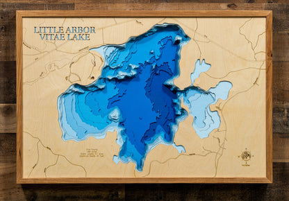 Laser-engraved relief map of Little Arbor Vitae Lake in Vilas County, WI, crafted from wood with high precision.