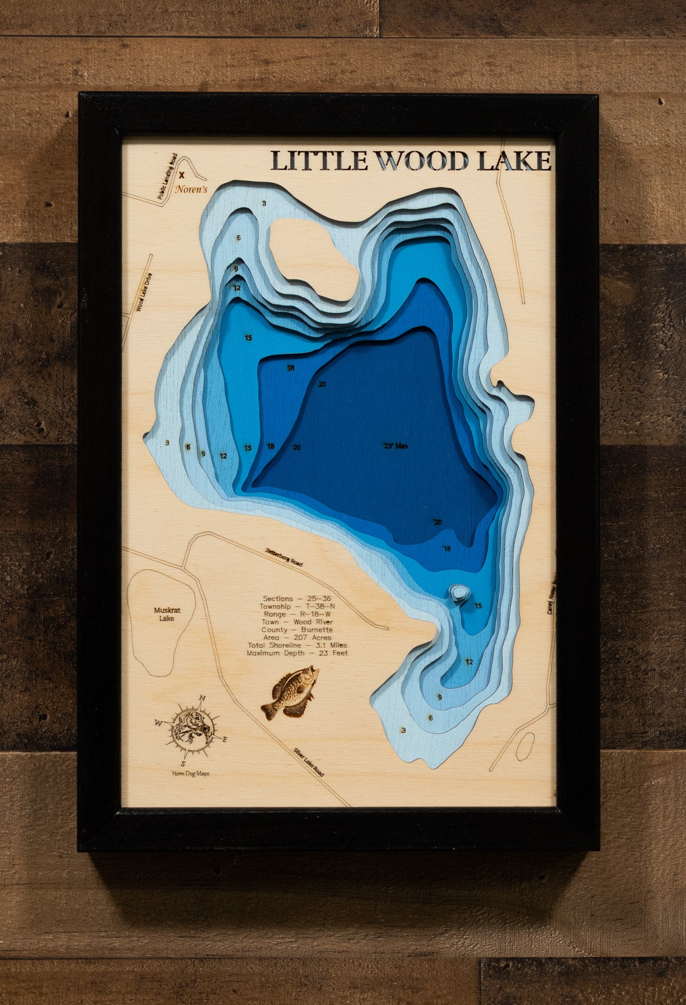 Artisanally carved wooden lake map of Little Wood Lake in Burnett County, WI, highlighting bathymetry.