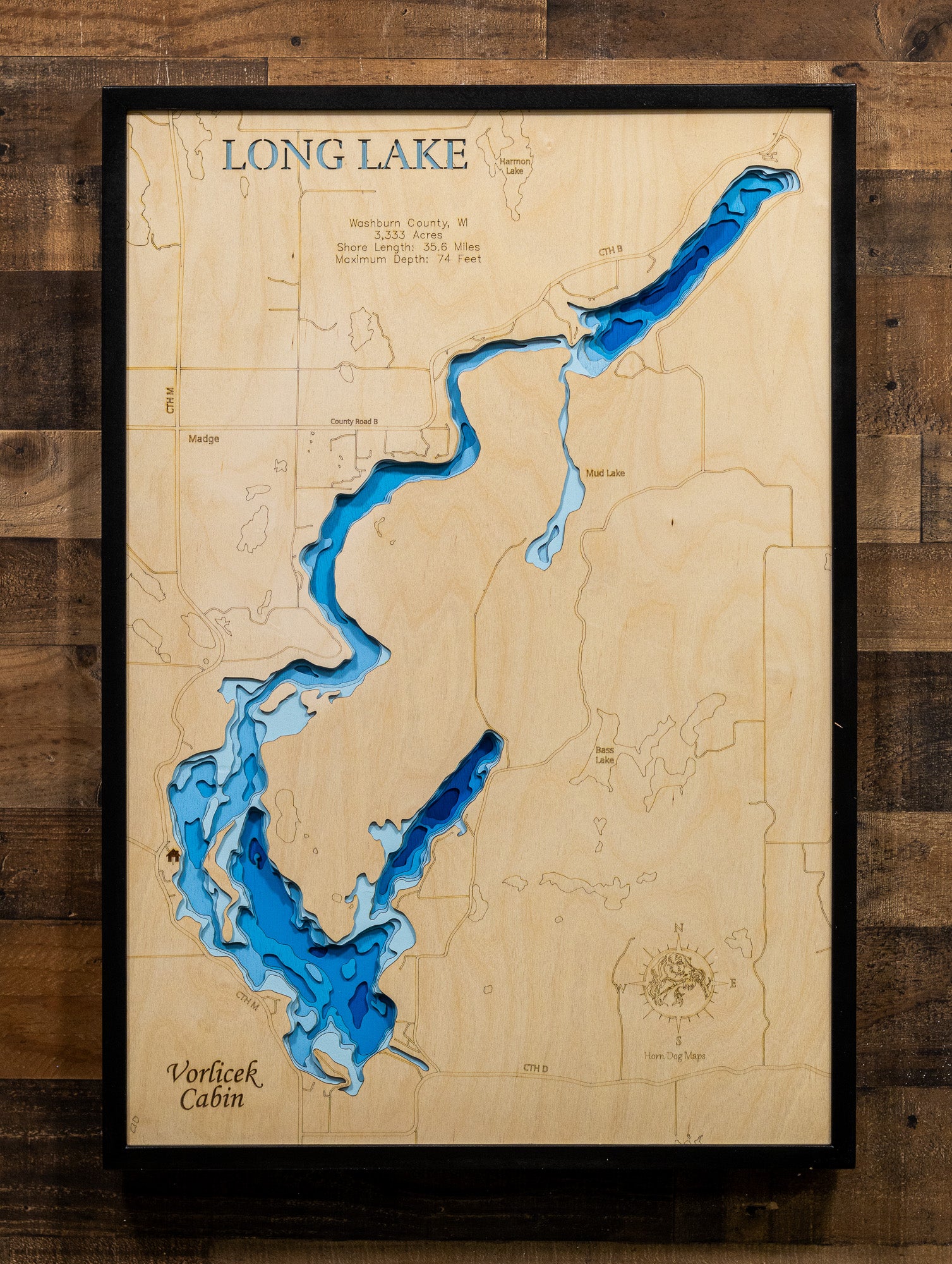 Artisanally carved wooden lake map of 3d Depth Map of Long Lake in Washburn County, WI, highlighting bathymetry.