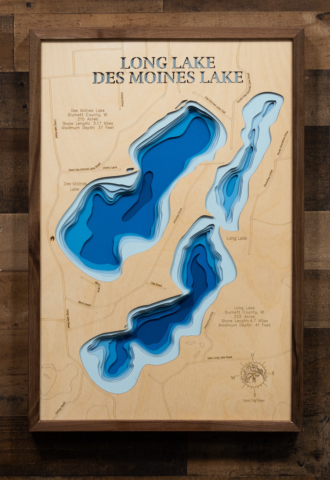 Artisanally carved wooden lake map of Des Moines Lake and Long Lake in Burnett County, WI, highlighting bathymetry.