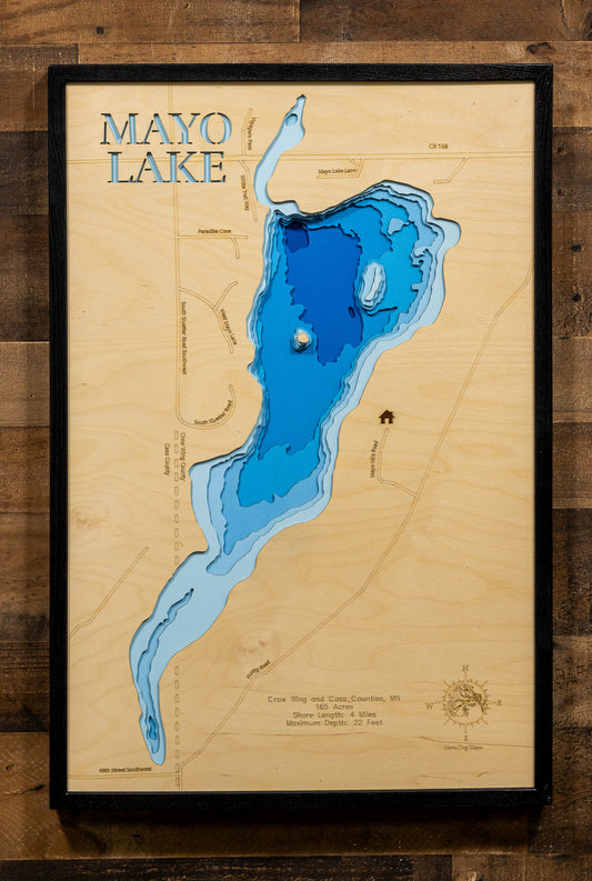 A highly detailed, laser-cut, and multi-layered wooden map of Mayo Lake in Crow Wing County, Minnesota. The map showcases the lake's compact 165-acre surface with shallow depth contours averaging 15 feet and reaching a maximum of 22 feet, emergent vegetation along shorelines, and 4 miles of peaceful shoreline surrounded by protected nature preserve.