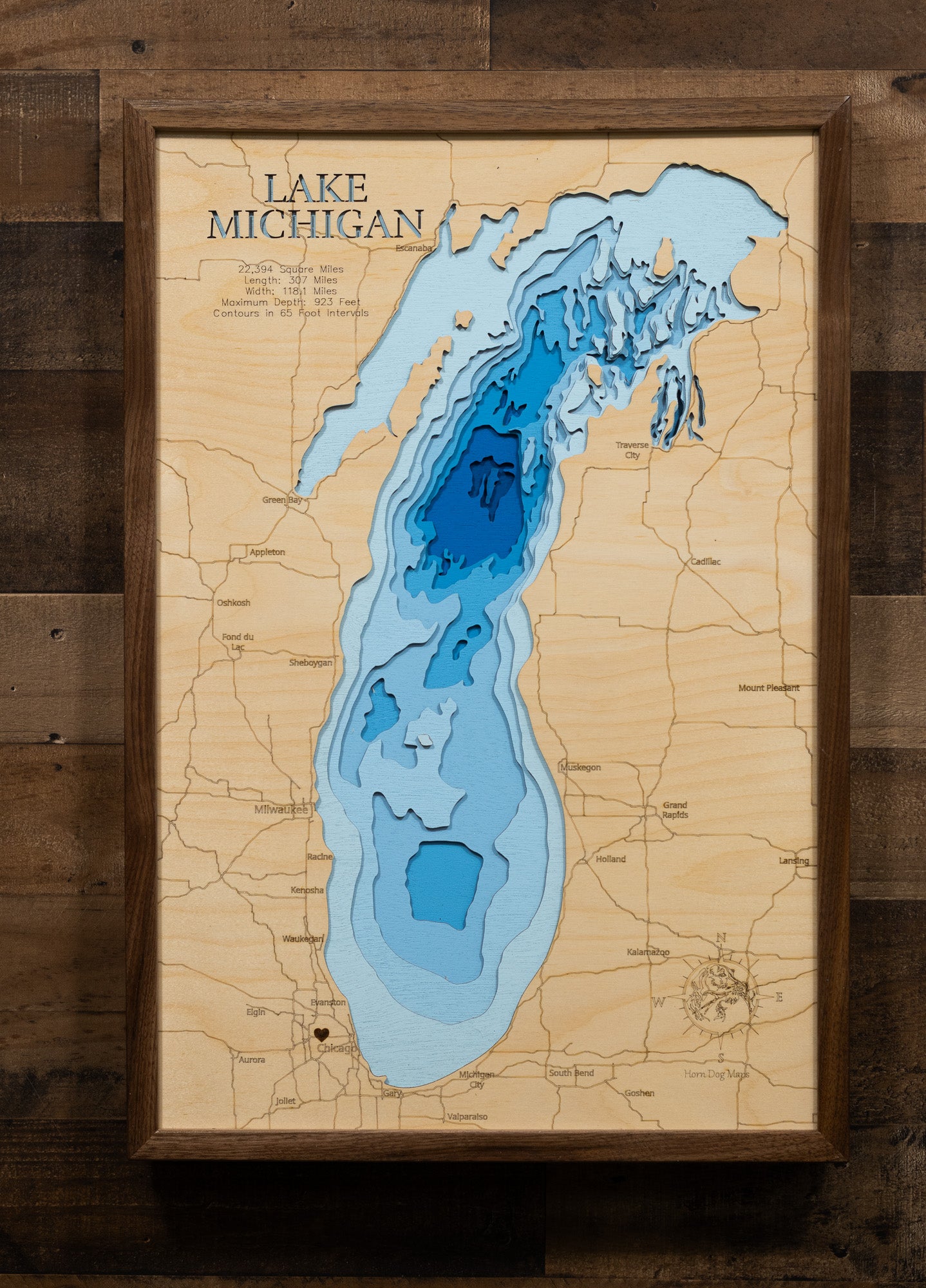 Lake Michigan engraved wood map, showcasing accurate topographical features.