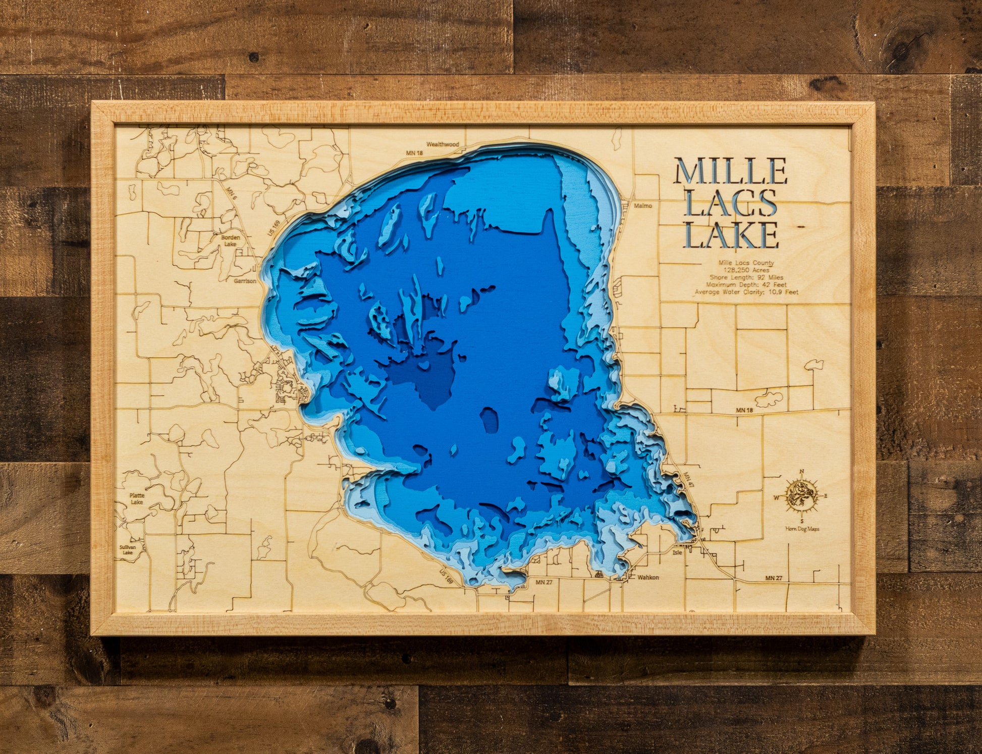 Custom wooden map of Mille Lacs Lake in Mille Lacs County, MN with layered depth highlights.