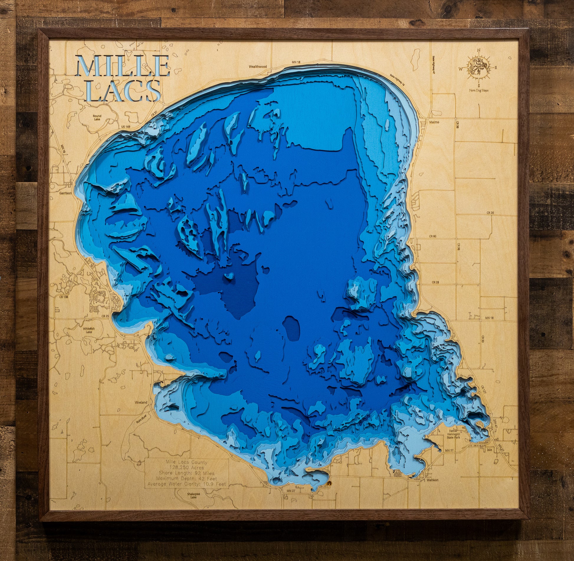 Custom wooden map of Mille Lacs Lake in Mille Lacs County, MN with layered depth highlights.