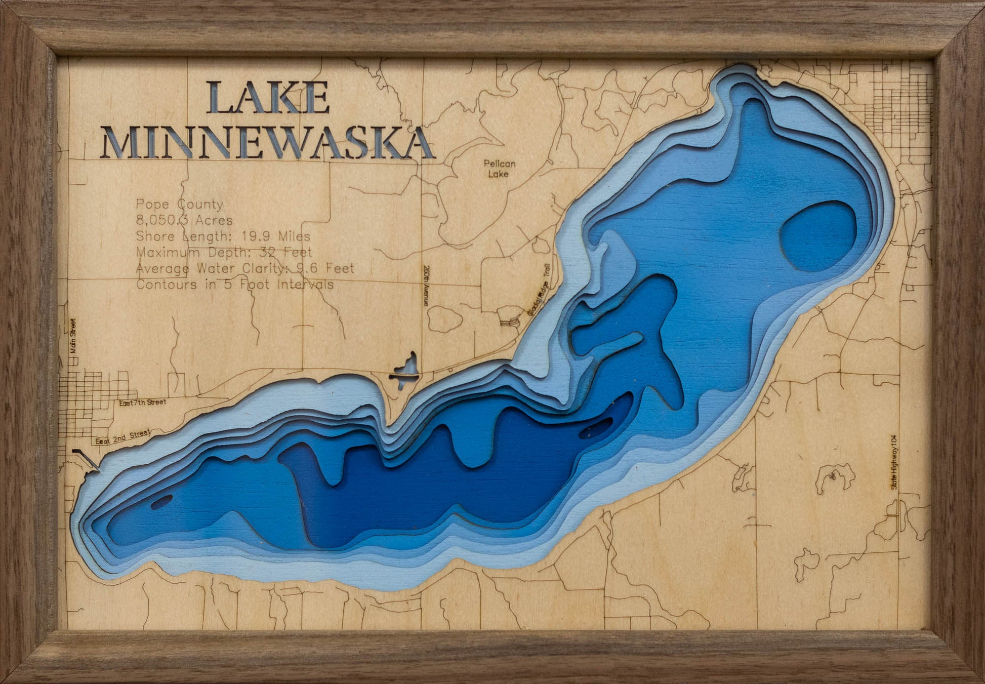 Unique wooden lake map of Lake Minnewaska in Pope County, MN, featuring intricate depth details.