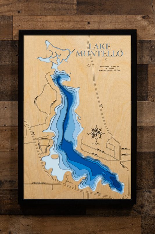 A precision laser-cut, multi-layered wooden map of Lake Montello in Marquette County, Wisconsin. The natural wood top layer traces the shoreline of this Fox River chain lake in fine detail, while a light-to-dark blue gradient conveys the lake's shallow, warmwater character. A handcrafted statement piece for any central Wisconsin lake home, cabin, or outdoor enthusiast's wall.