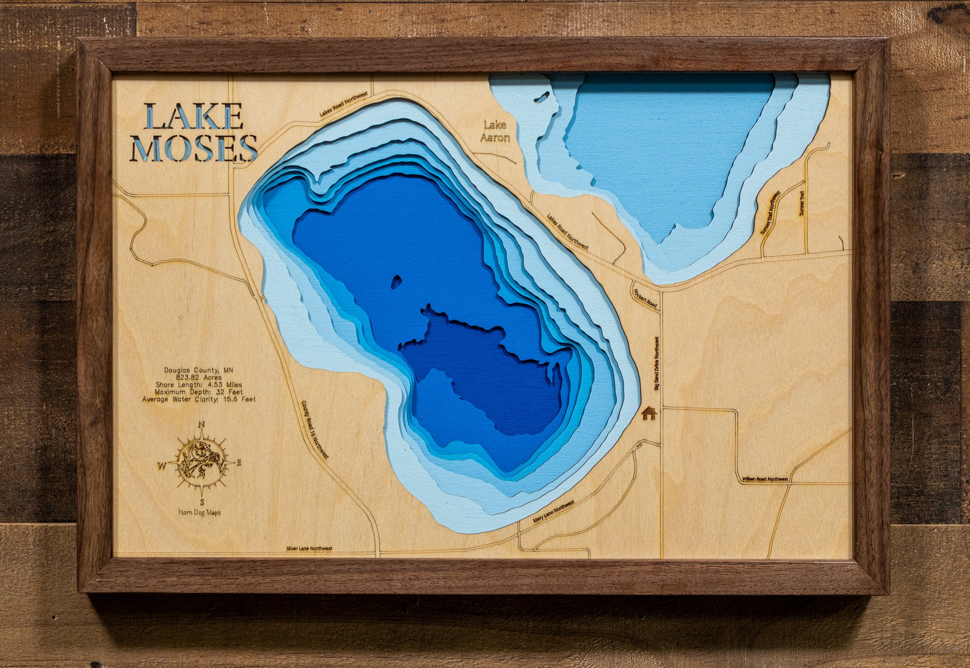 3D wooden lake map of Lake Moses in Douglas County, MN , showcasing detailed depth layers and contours.