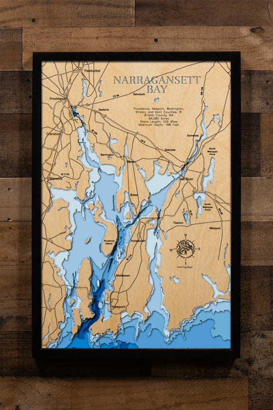 An expertly crafted laser-cut wooden map of Narragansett Bay, New England's largest estuary, showcasing the 147-square-mile bay spanning Rhode Island and Massachusetts, over 30 islands including Aquidneck, Conanicut, and Prudence, 256 miles of intricate shoreline, three distinct passages (West, East, and Sakonnet River), and layered depth contours revealing the 188-foot maximum depth.