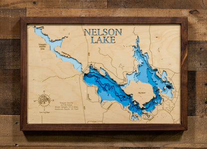 Laser-engraved relief map of Nelson Lake in Sawyer County, WI, crafted from wood with high precision.