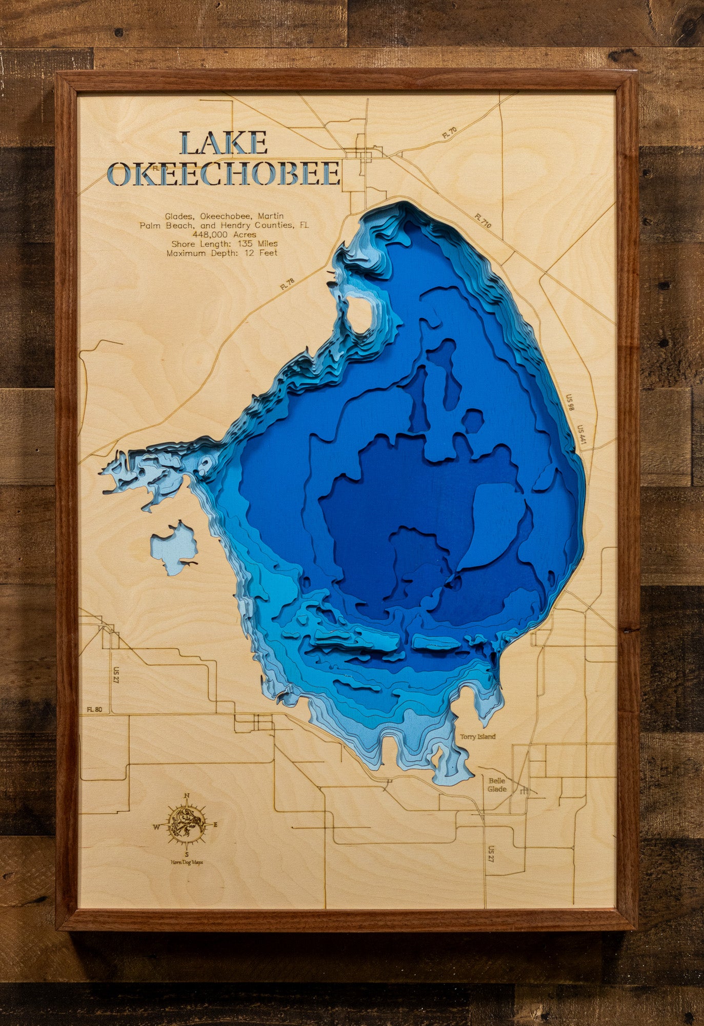 Lake Okeechobee, the largest freshwater lake in Florida and the second-largest natural freshwater lake entirely within the contiguous 48 states, spans across Glades, Hendry, Martin, Okeechobee, and Palm Beach Counties. Covering