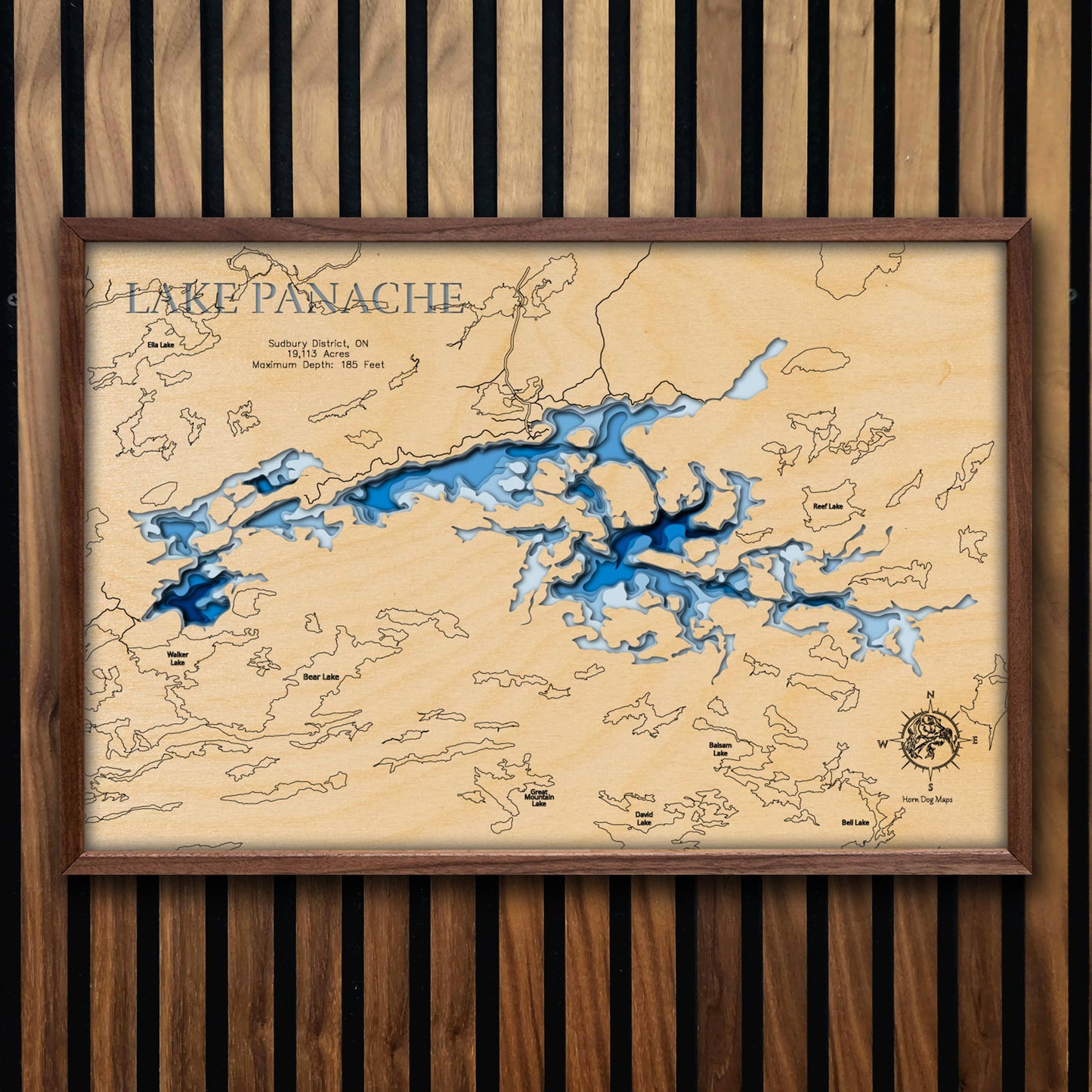 Laser-engraved relief map of Lake Panache in Sudbury District, ON, crafted from wood with high precision.