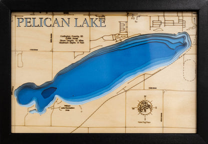 Detailed wooden relief map of Pelican Lake in Codington County, SD, showcasing its natural beauty.