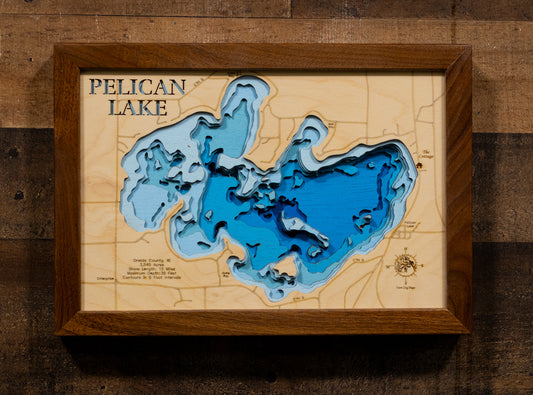 Artisanally carved wooden lake map of Pelican Lake in Oneida County, WI, highlighting bathymetry.