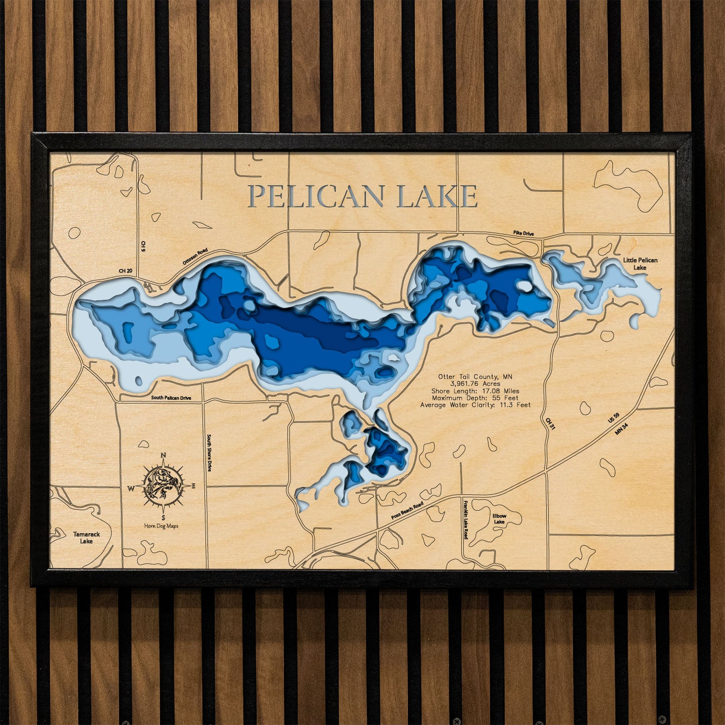 Artisanally carved wooden lake map of Pelican Lake in Otter Tail County, MN, highlighting bathymetry.