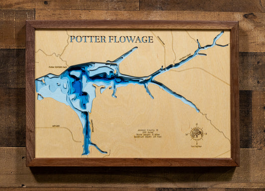 A meticulously detailed, laser-cut, multi-layered wooden topographical map of Potter Flowage in Jackson County, Wisconsin, showcasing the 255-acre impoundment's distinctive T-shape with McKenna and Morrison Creek inlets, numerous bays along approximately five miles of pine-lined shoreline, and extensive lily pad beds. The natural wood top layer frames the dark-water flowage with depth contours from the 7-foot average to the 24-foot maximum near the dam, while graduated blue layers create a gentle visual dep