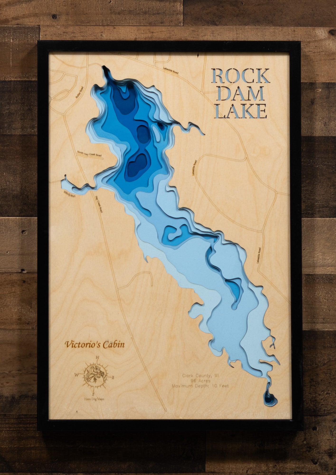 Wooden relief map of Rock Dam Lake in Clark County, WI, handmade for durability.