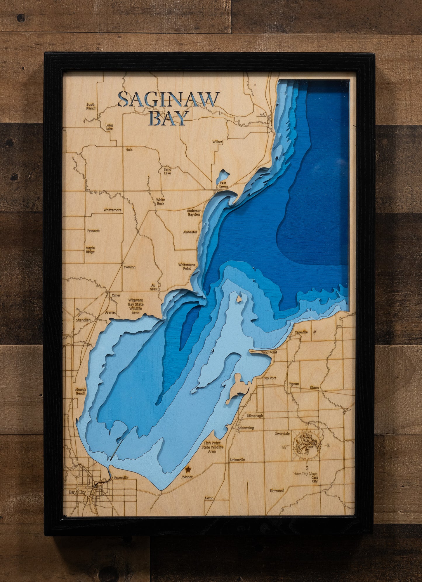 Precision-cut wooden map of Saginaw Bay in Michigan, perfect for unique decor.
