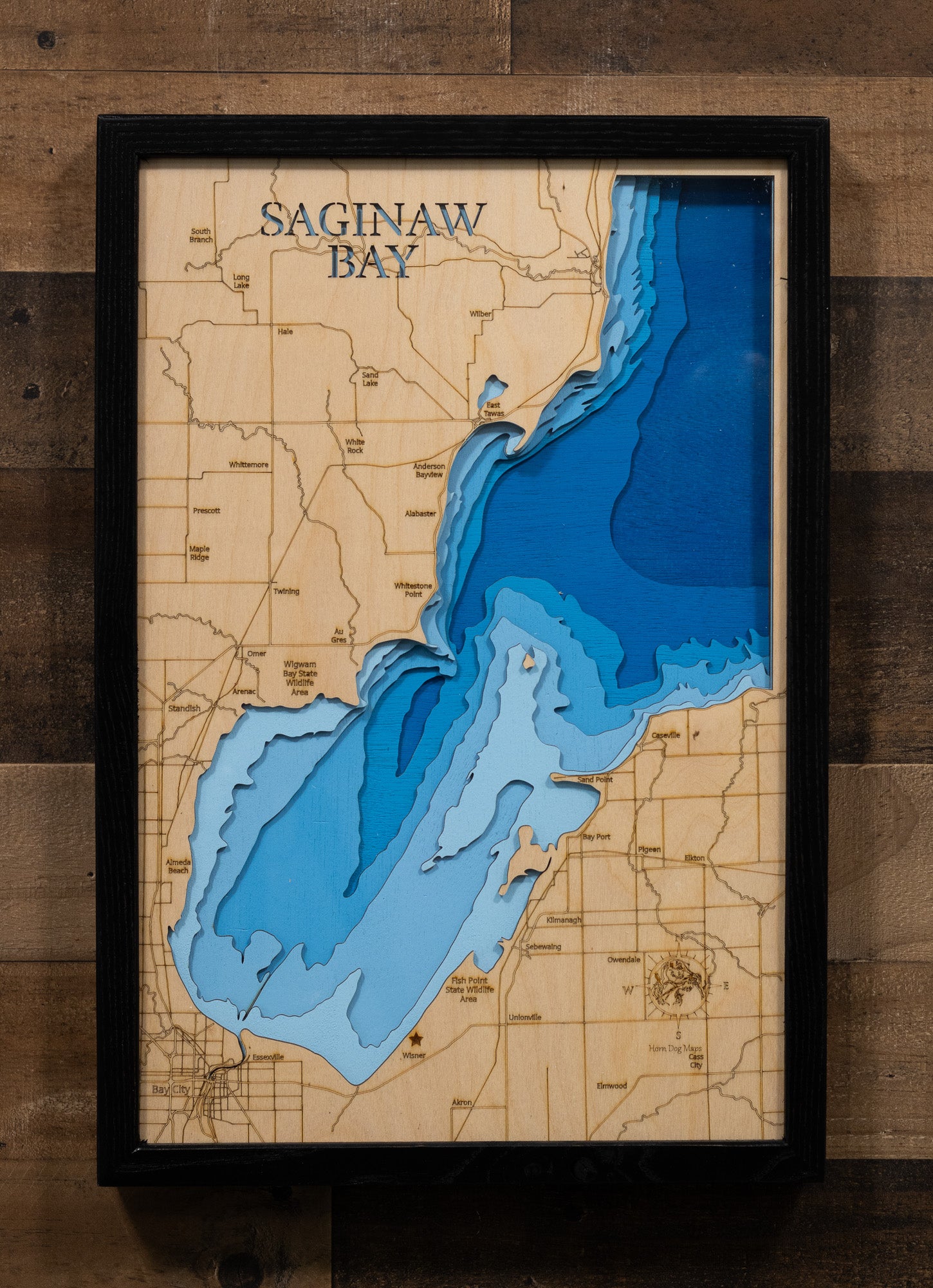 Precision-cut wooden map of Saginaw Bay in Michigan, perfect for unique decor.
