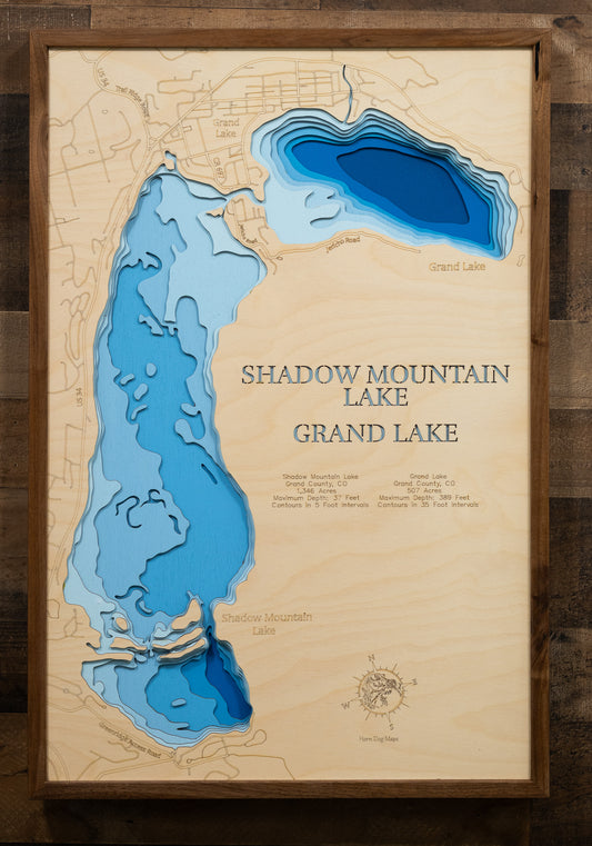  A laser-cut, layered wood map of Shadow Mountain Lake and Grand Lake, Colorado, highlighting their interconnected shorelines and surrounding mountainous terrain.