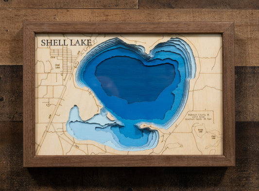 Artisanally carved wooden lake map of Laser Cut Lake Map of Shell Lake in Washburn County, WI, highlighting bathymetry.