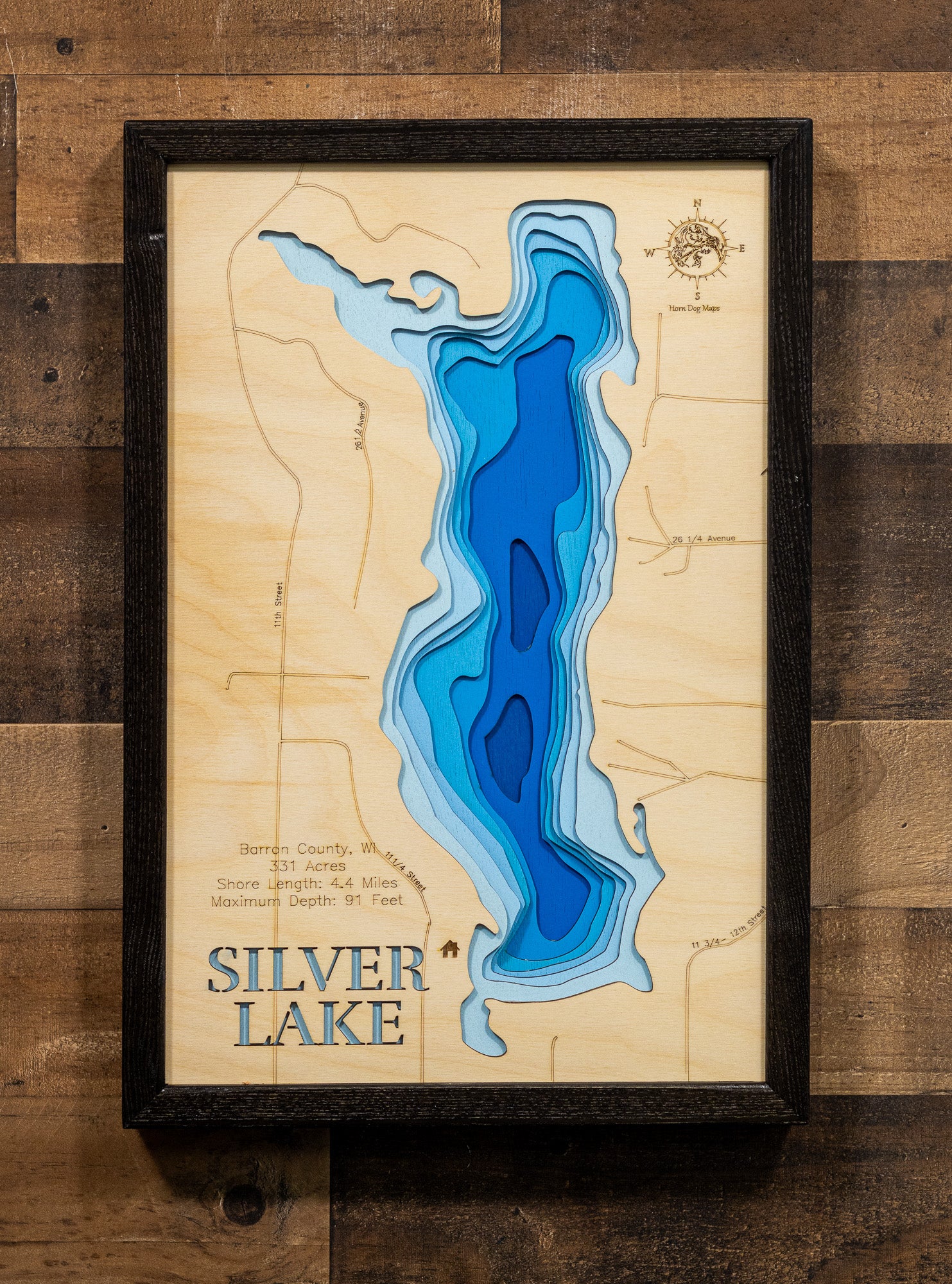 Detailed wooden relief map of Silver Lake in Barron County, WI, showcasing its natural beauty.